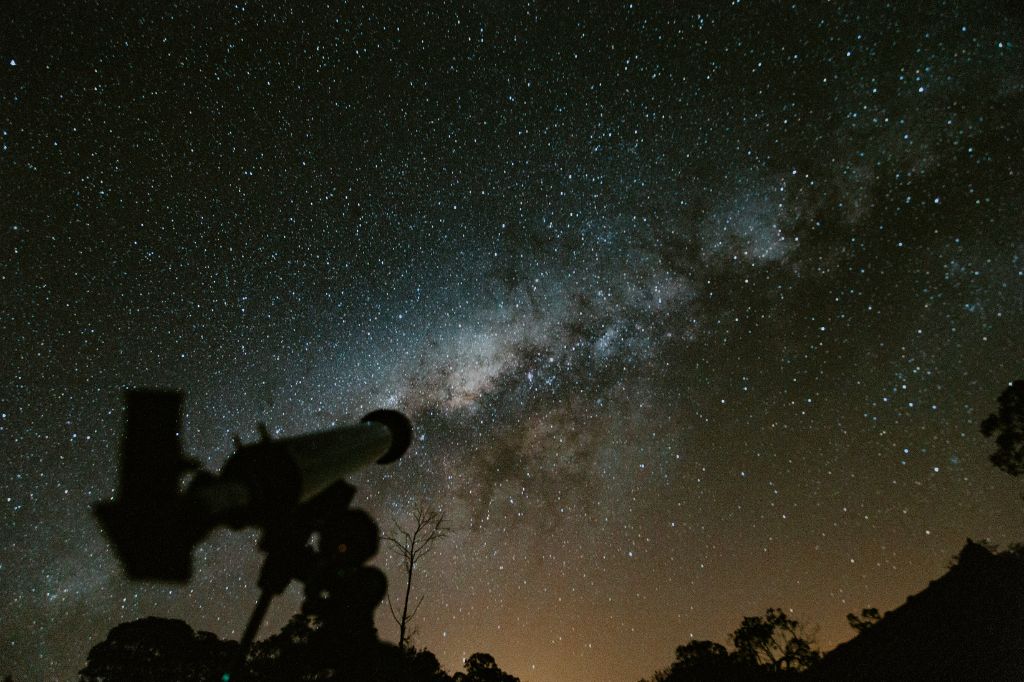 the telescope is pointed at the starry sky